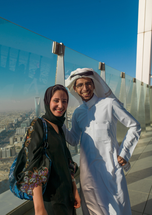 Saudi couple at the top of the kingdom center, Riyadh Province, Riyadh, Saudi Arabia