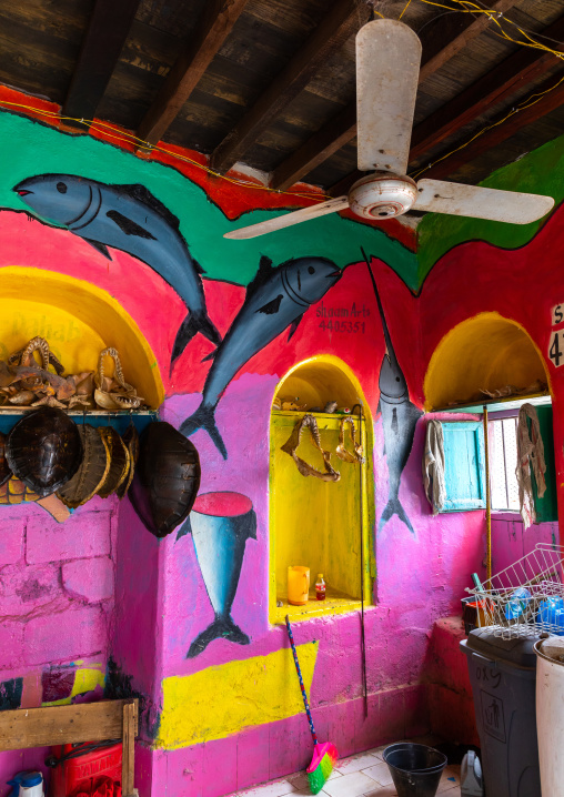 Colorful decoration inside a fisherman shop, Sahil region, Berbera, Somaliland