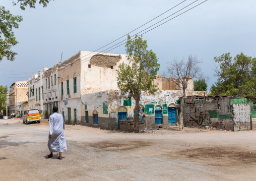 Somali man walking in the old city, Sahil region, Berbera, Somaliland