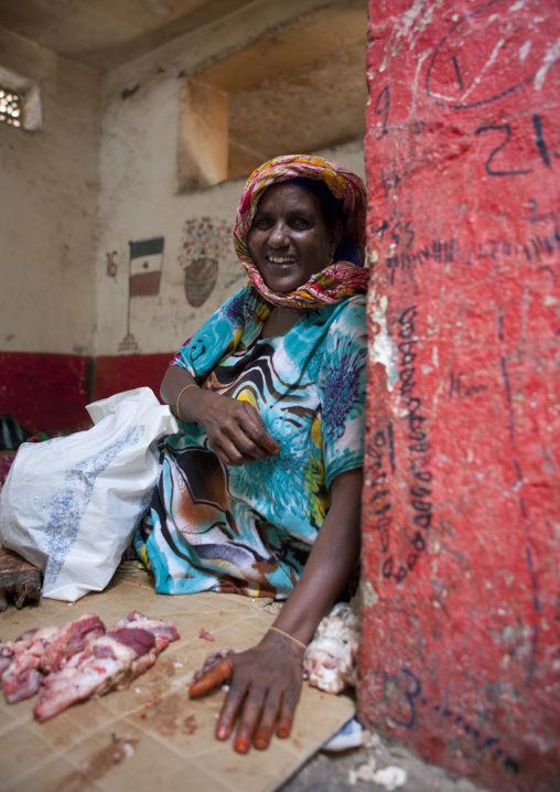 A Woman Is Sitting On The Floor Selling Meat, Hargeisa Market, Somaliland