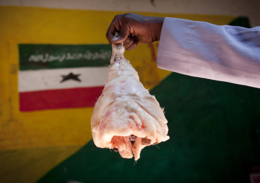 A Market Meat Vendor Is Holding A Piece Of Meat,  Hargeisa Market, Somaliland