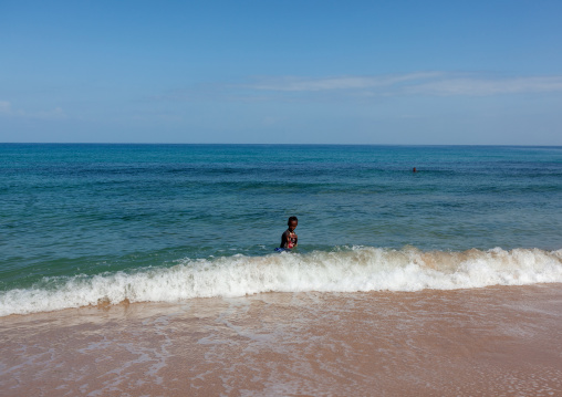 Somali boy having a bath in the sea, North-Western province, Berbera, Somaliland