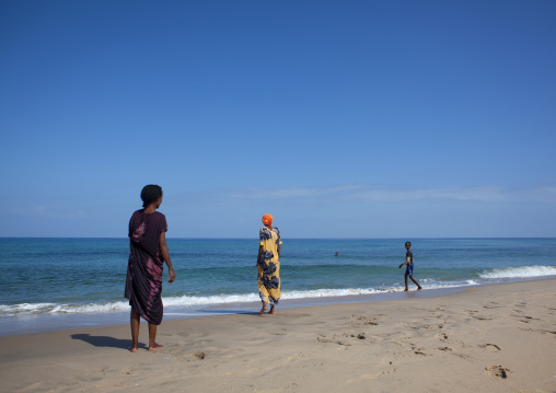 People Walking Along The Seashore On The Beach, Berbera, Somaliland