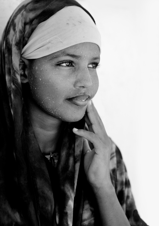 Portrait Of Beautiful Thoughtful Teenage Girl Wearing Qasil On Her Face, Berbera, Somaliland