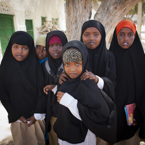 Group Of Schoolgirls Wearing Black Hijabs In A Street Of Berbera, Somaliland