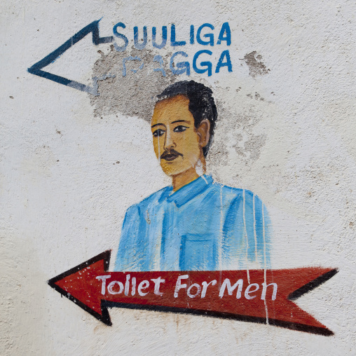 A Painted Sign Showing The DIrection Of Toilet For Men In A Restaurant, Berbera, Somaliland