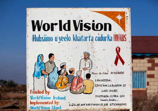A painted billboard advertisement for world vision ngo about aids, Woqooyi Galbeed province, Baligubadle, Somaliland