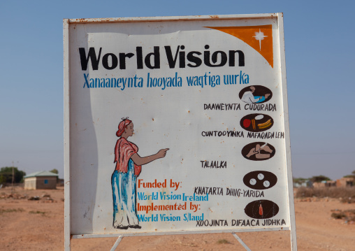 A painted billboard advertisement for world vision ngo about health, Woqooyi Galbeed province, Baligubadle, Somaliland