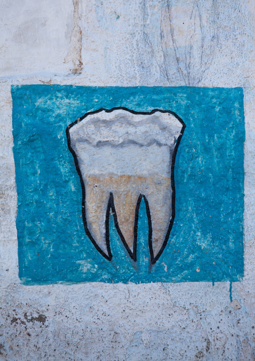 A painted advertisement sign for a dentist, Woqooyi Galbeed region, Hargeisa, Somaliland