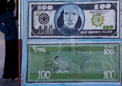 A Painted Advertisement Sign For Money Change Depicting Banknotes, Boorama, Somaliland