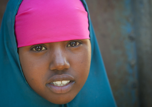 Portrait Of A Teenage Girl Wearing A Pink Headband And A Blue Hijab, Boorama, Somaliland