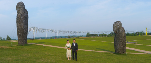 North korean defector joseph park with his south korean fiancee called juyeon in imjingak park, Sudogwon, Paju, South korea