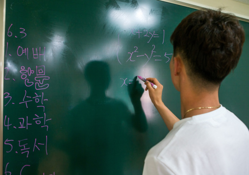 North korean teen defector in yeo-mung alternative school during a math course, National capital area, Seoul, South korea