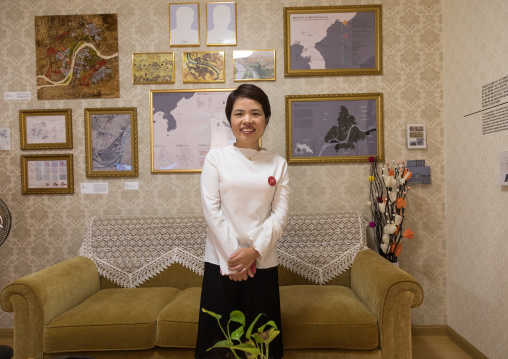 North Korean defector guide mrs moon during the exhibition Pyongyang sallim at architecture biennale showing a north Korean apartment replica, National Capital Area, Seoul, South Korea
