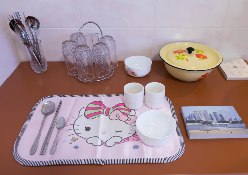 Hello Kitty table set during the exhibition Pyongyang sallim at architecture biennale showing a north Korean apartment replica, National Capital Area, Seoul, South Korea