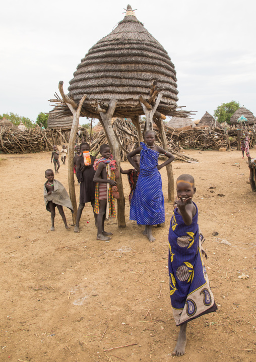 Toposa tribe children standing near a granary in a village, Namorunyang State, Kapoeta, South Sudan