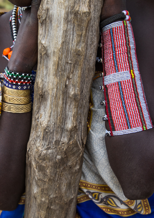 Arms of Toposa tribe woman decorated with beaded bracelets, Namorunyang State, Kapoeta, South Sudan