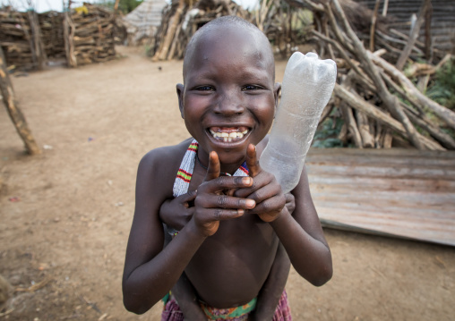 Smiling Toposa tribe girl in a village, Namorunyang State, Kapoeta, South Sudan
