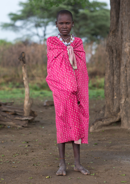 Portrait of a Toposa girl in pink clothing, Namorunyang State, Kapoeta, South Sudan
