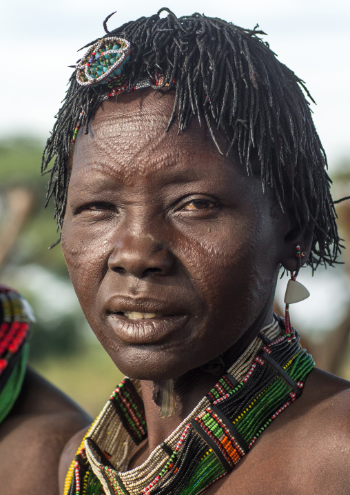 Toposa tribe woman with scarifications on the face and the forehead, Namorunyang State, Kapoeta, South Sudan