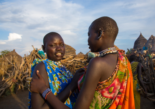 Toposa tribe young women in traditional clothing, Namorunyang State, Kapoeta, South Sudan
