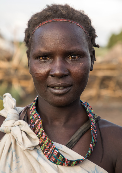 Portrait of a Toposa tribe woman with rings on the hand, Namorunyang State, Kapoeta, South Sudan