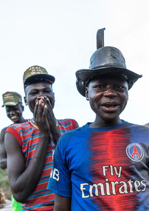 Larim tribe young men with fashionnable clothes, Boya Mountains, Imatong, South Sudan