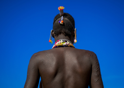 Larim tribe woman with scarifications on her back, Boya Mountains, Imatong, South Sudan