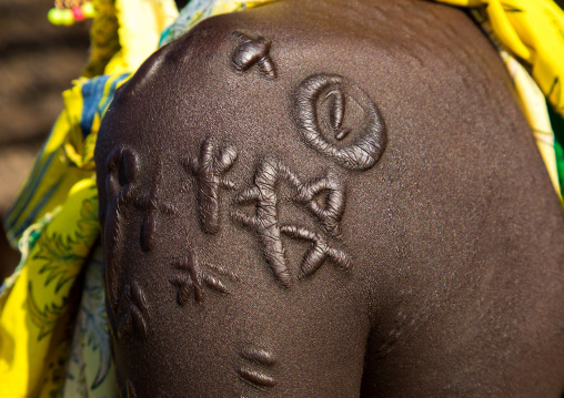 Larim tribe woman with scarifications on her shoulder, Boya Mountains, Imatong, South Sudan