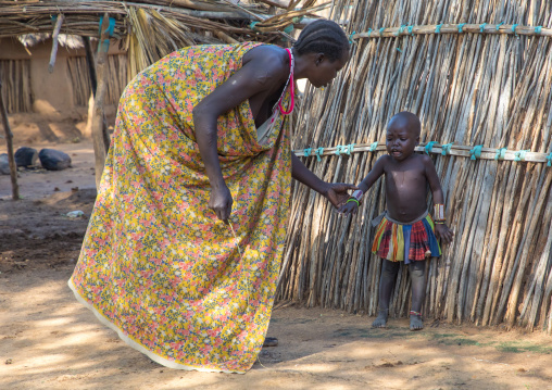 Larim tribe woman scolding her daughter, Boya Mountains, Imatong, South Sudan
