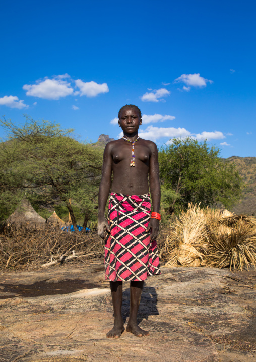 Portrait of a Larim tribe woman with scarifications on her body, Boya Mountains, Imatong, South Sudan