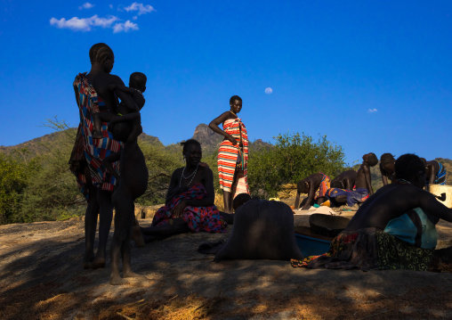 Larim tribe women resting after grinding, Boya Mountains, Imatong, South Sudan