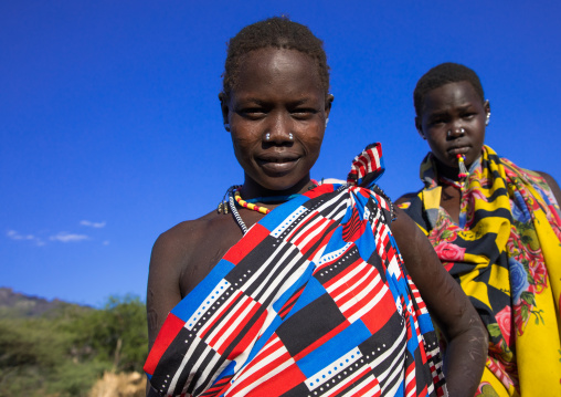 Larim tribe women with colorful clothing, Boya Mountains, Imatong, South Sudan