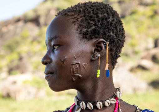 Scarifications on the cheek of a Larim tribe young woman, Boya Mountains, Imatong, South Sudan