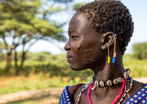 Scarifications on the cheek of a Larim tribe young woman, Boya Mountains, Imatong, South Sudan