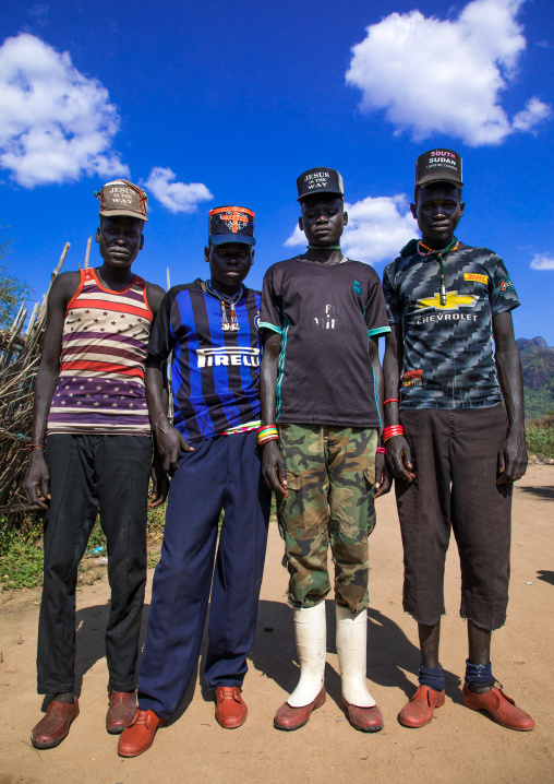 Larim tribe men dressed in a fashionable way, Boya Mountains, Imatong, South Sudan
