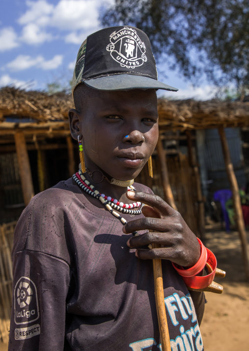Larim tribe boy dressed in a fashionable way, Boya Mountains, Imatong, South Sudan