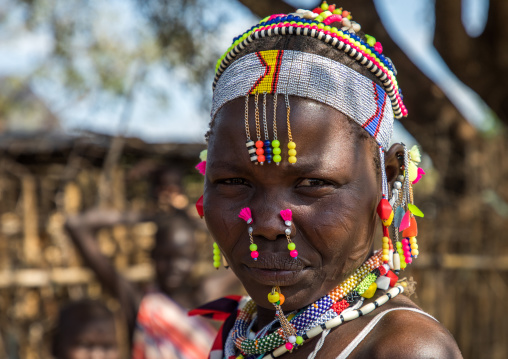 Portrait of a Larim tribe woman with a lot of decorations, Boya Mountains, Imatong, South Sudan