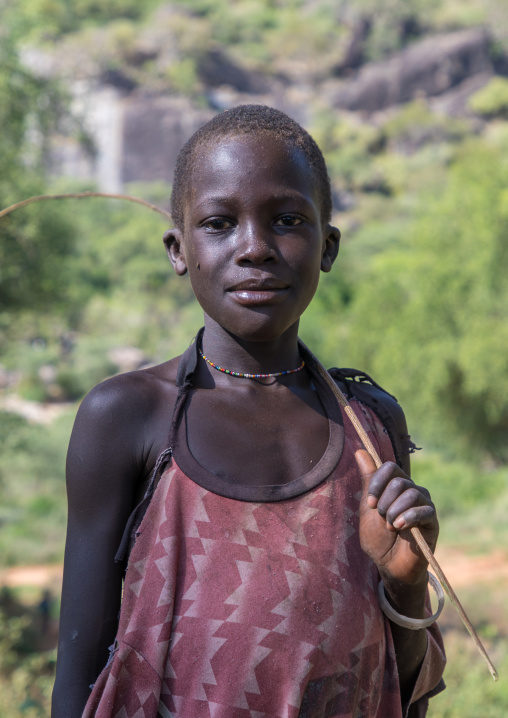 Portrait of a smiling Toposa tribe boy, Boya Mountains, Imatong, South Sudan