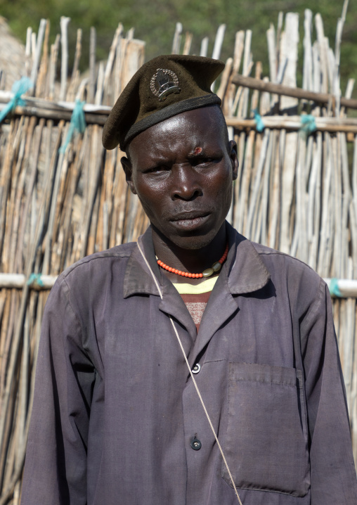 Portrait of a Larim tribe man wearing a military beret, Boya Mountains, Imatong, South Sudan