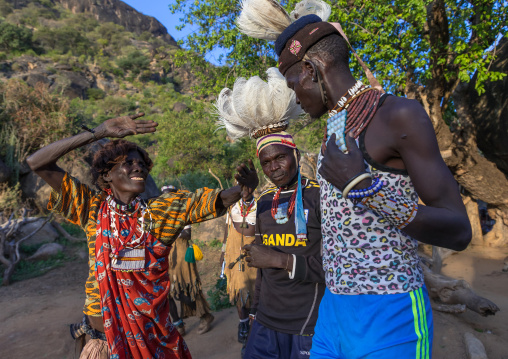 Larim tribe groom dancing with women during his wedding, Boya Mountains, Imatong, South Sudan