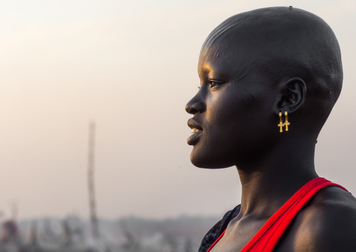 Portrait of a Mundari tribe woman with scarifications and bald head, Central Equatoria, Terekeka, South Sudan