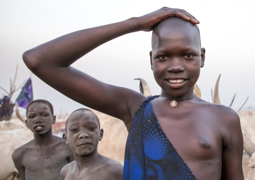 Portrait of Mundari young tribe woman in a cattle camp, Central Equatoria, Terekeka, South Sudan