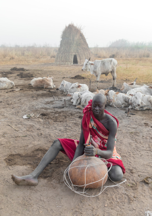 Mundari tribe man with a calabash in a cattle camp, Central Equatoria, Terekeka, South Sudan