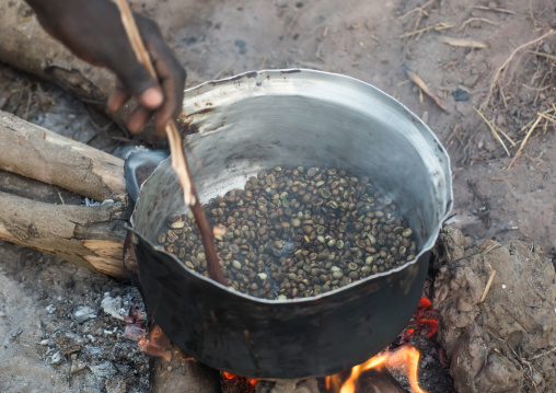 Mundari tribe woman roasting coffee, Central Equatoria, Terekeka, South Sudan