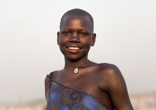 Portrait of a smiling Mundari tribe woman, Central Equatoria, Terekeka, South Sudan