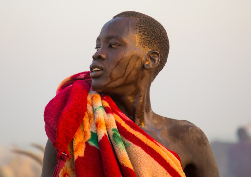 Mundari tribe man sweating in a cattle camp, Central Equatoria, Terekeka, South Sudan