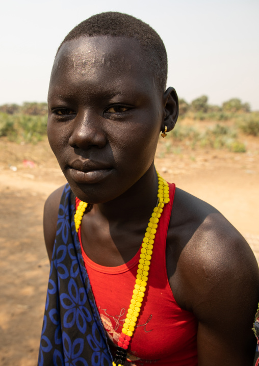 Mundari tribe woman with scars on the forehead made to fight the fever, Central Equatoria, Terekeka, South Sudan