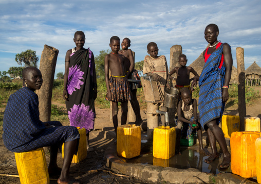 Mundari tribe women pumping water in a well, Central Equatoria, Terekeka, South Sudan