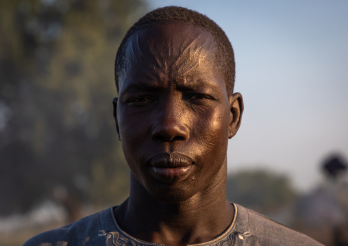 Portrait of a Mundari tribe man with scarifications on the forehead, Central Equatoria, Terekeka, South Sudan